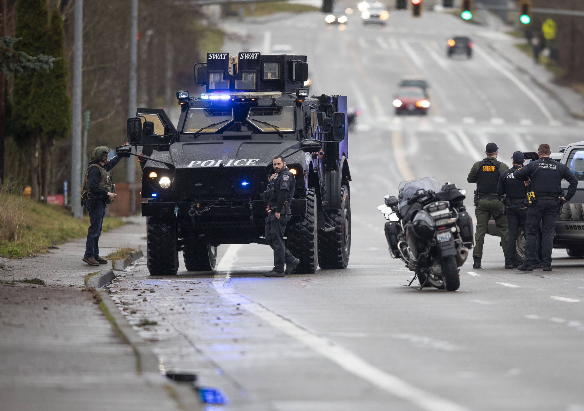 A SWAT vehicle drives along 112th Street SW on Wednesday, Jan. 31, 2024 in Everett, Washington. (Olivia Vanni / The Herald)