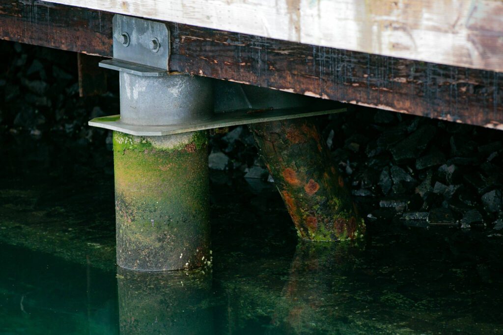 Part of the seawall at the Port of Edmonds, which is in need of replacement, is pictured Wednesday, Jan. 24, 2024, in Edmonds, Washington. (Ryan Berry / The Herald)
