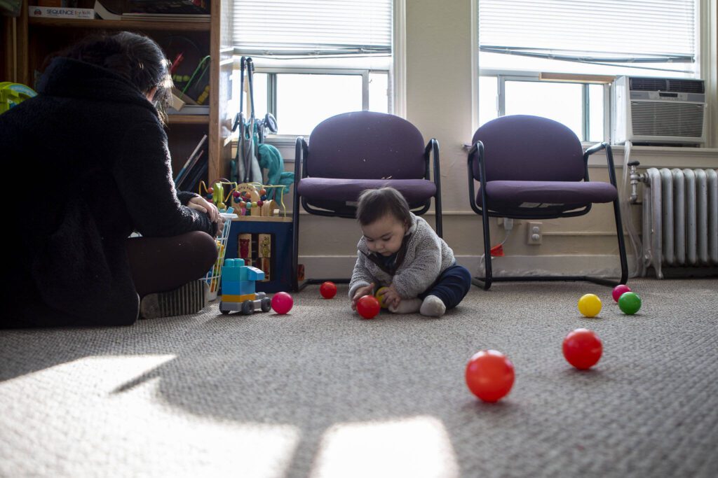 Emilio Gomez, 9 months, plays at the Parent-Child Assistance Program office at Sound Pathways in Everett, Washington, on Friday, Jan. 12, 2024. (Annie Barker / The Herald)
