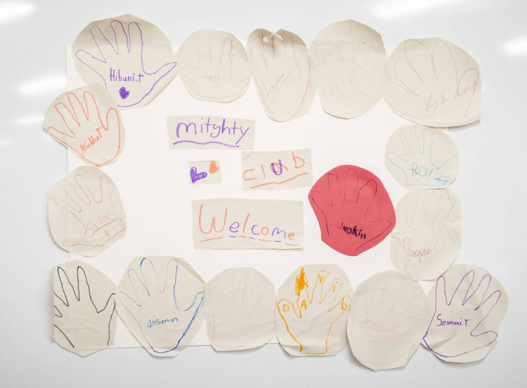 Hand outlines are displayed on a whiteboard during a new free after-school program at Connect Casino Road on Monday, Jan. 29, 2024 in Everett, Washington. (Olivia Vanni / The Herald)
