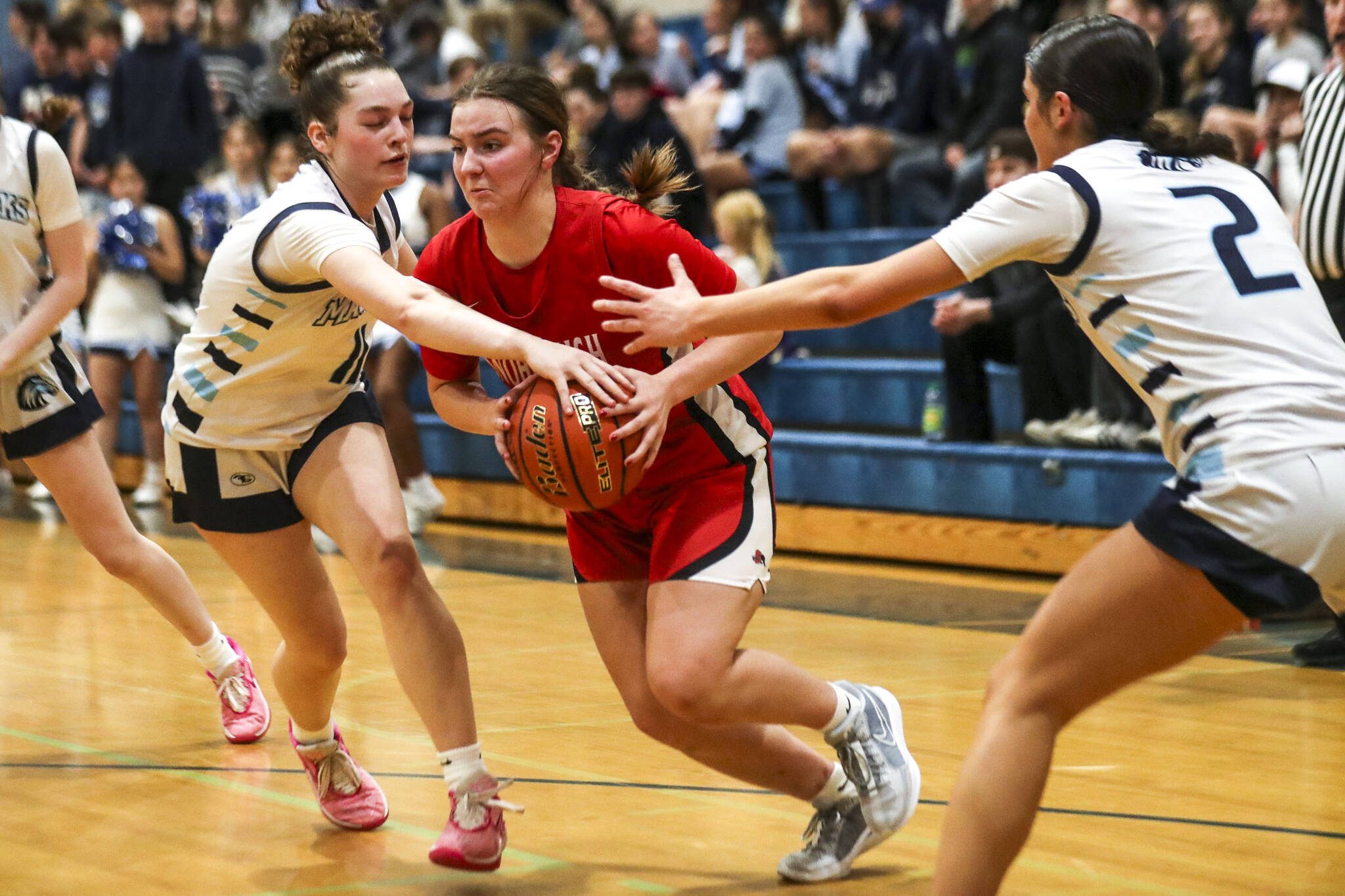 Snohomish’s Kendall Hammer (3) moves with the ball during a game against Meadowdale on Wednesday at Meadowdale High School in Lynnwood. Snohomish won 57-53. (Annie Barker / The Herald)