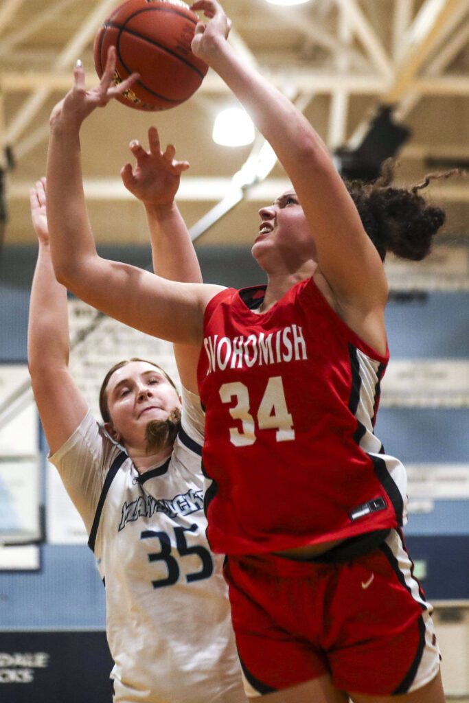 Snohomish’s Tyler Gildersleeve-Stiles (34) shoots the ball during a game against Meadowdale on Wednesday at Meadowdale High School in Lynnwood. (Annie Barker / The Herald)
