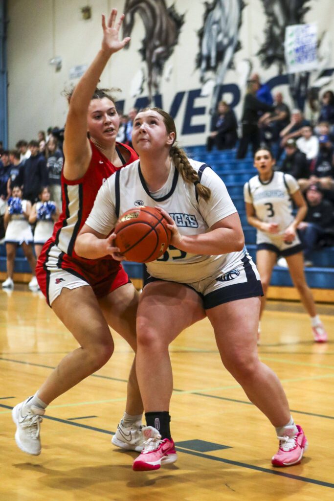 Meadowdale’s Audrey Lucas (35) looks to shoot during a game against Snohomish on Wednesday at Meadowdale High School in Lynnwood. (Annie Barker / The Herald)
