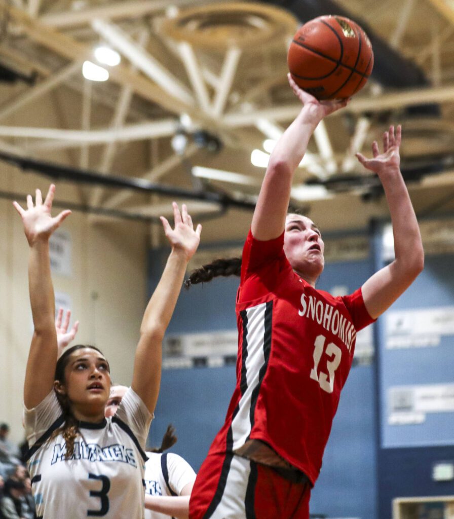 Snohomish’s Sienna Capelli (13) shoots the ball during a game against Meadowdale on Wednesday at Meadowdale High School in Lynnwood. (Annie Barker / The Herald)
