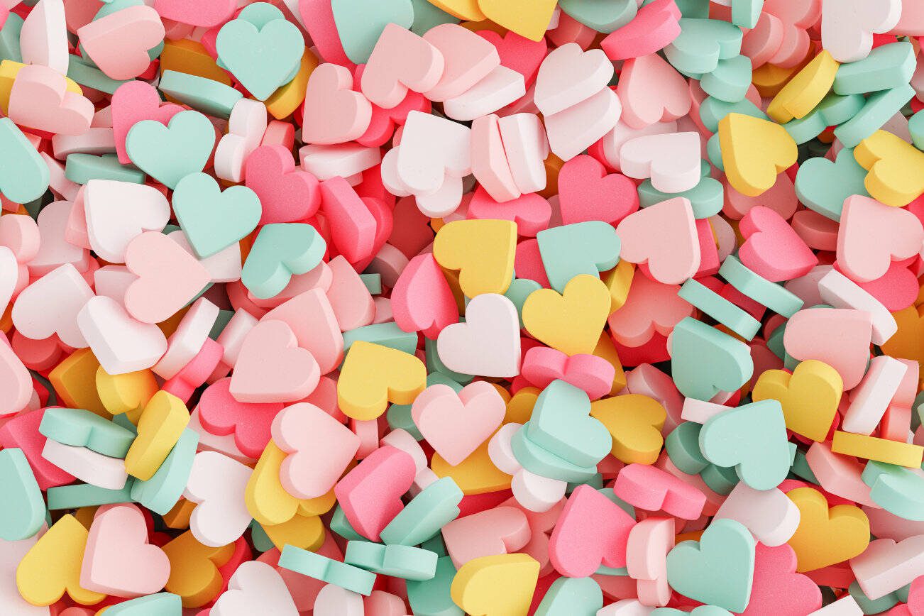 colorful background of many stacked heart shaped pills. 3d rendering