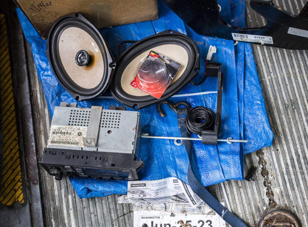Parts of the van stereo cover the floor on Monday, Feb. 5, 2024 in Granite Falls, Washington. (Olivia Vanni / The Herald)
