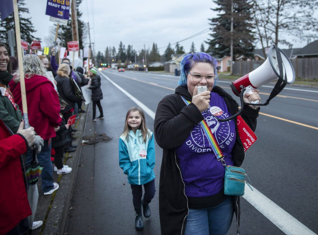 Amber Buehler leads chants during a rally outside of the Marysville School Board on Monday, Feb. 5, 2024 in Marysville, Washington. (Olivia Vanni / The Herald)
