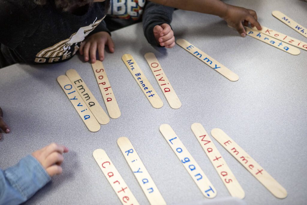 Students turn in their attendance sticks in Leeanne Bennett’s transitional kindergarten class at Jefferson Elementary on Wednesday, Feb. 14, 2024 in Everett, Washington. (Annie Barker / The Herald)
