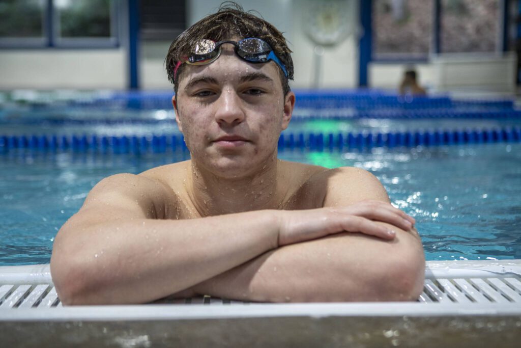 Jackson High School swimmer Ethan Georgiev poses for a photo on Wednesday, Feb. 7, 2024 at West Coast Aquatics in Bothell, Washington. (Annie Barker / The Herald)
