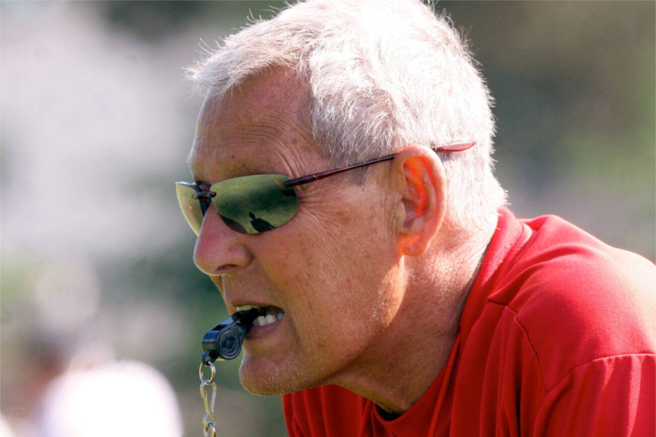 Chris Goodenow / Weekly Herald File
Archbishop Murphy head football coach Terry Ennis watches his players as he gets ready to blow the whistle during varsity football practice, Wednesday, June 20, 2007 at Archbishop Murphy High School.