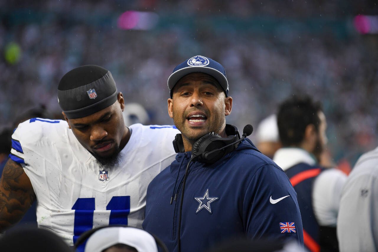 Aden Durde talks to his players while coaching the Dallas Cowboys during a game against the Miami Dolphins on Dec. 24, 2023, in Miami Gardens, Fla. Durde is expected to be hired as the new defensive coordinator for the Seattle Seahawks. (AP Photo/Michael Laughlin)
