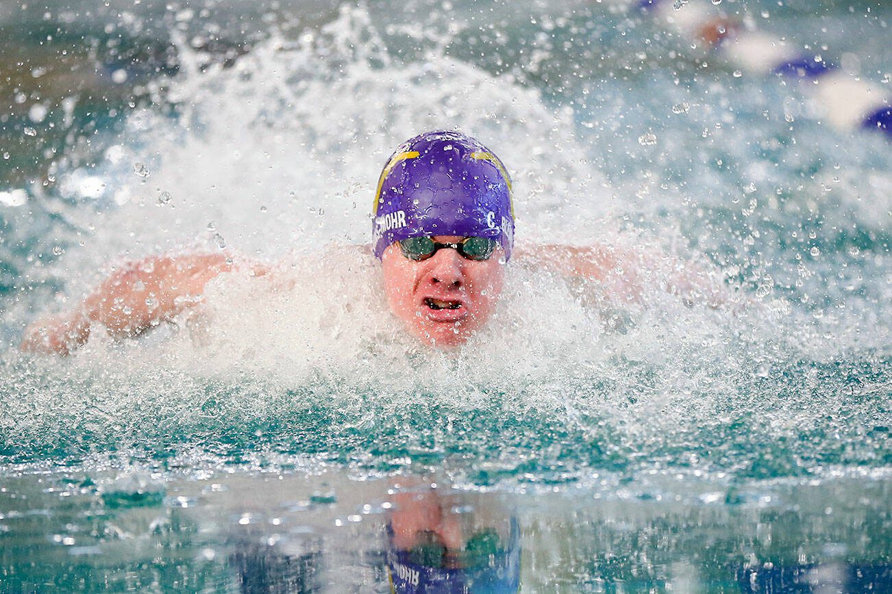 Lake Stevens junior Camden Blevins-Mohr swims in the 100 yard butterfly during the WESCO 4A Boys Swim and Dive meet Saturday, Feb. 10, 2024, at the Snohomish Aquatic Center in Snohomish, Washington. (Ryan Berry / The Herald)