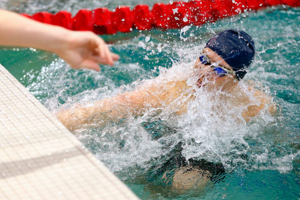 Shorewood freshman Frederick Anderson makes a turn during his victory in the 200 yard individual medley during the WESCO 3A Boys Swim and Dive meet Saturday, Feb. 10, 2024, at the Snohomish Aquatic Center in Snohomish, Washington. (Ryan Berry / The Herald)
