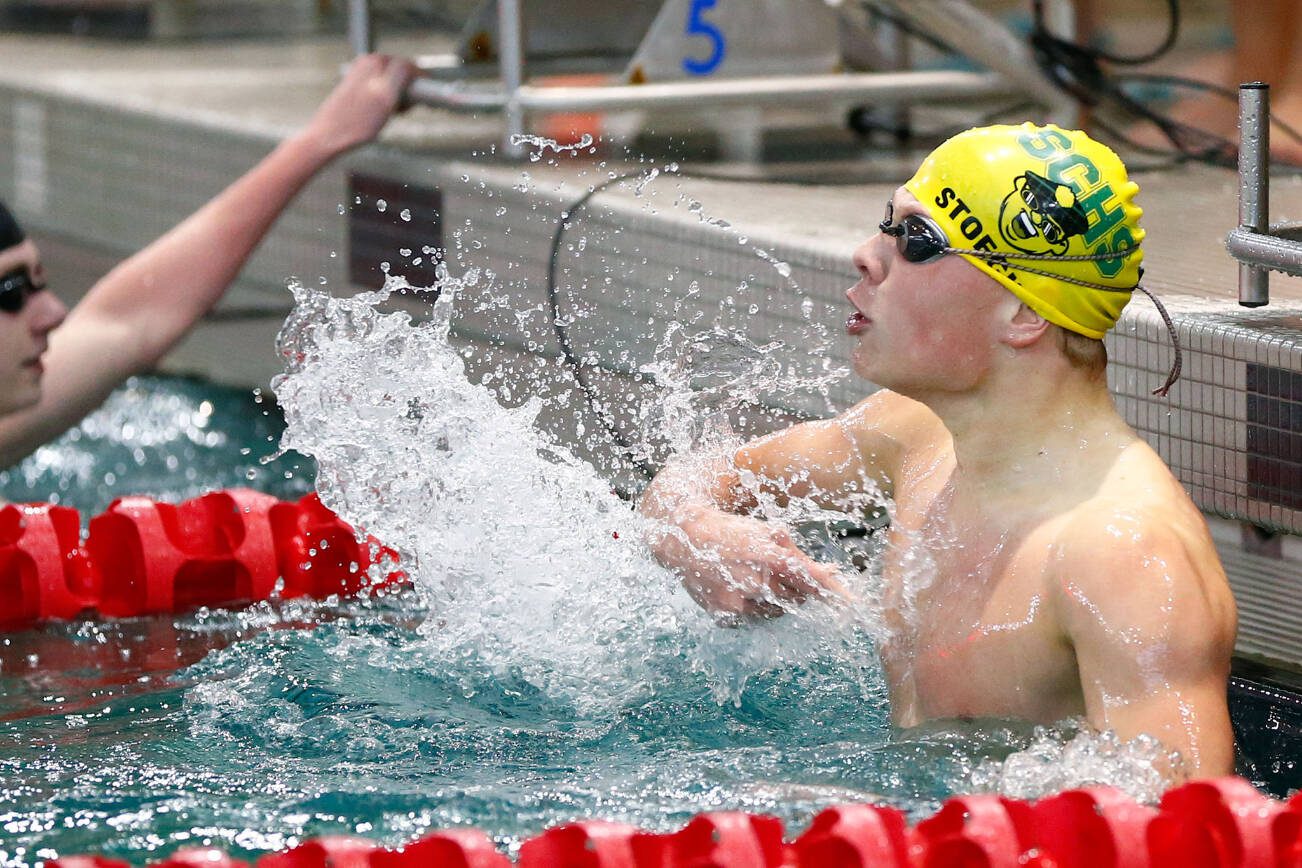 Shorecrest junior Colton Stoecker celebrates a come-from-behind win in the 200 yard freestyle during the WESCO 3A Boys Swim and Dive meet Saturday, Feb. 10, 2024, at the Snohomish Aquatic Center in Snohomish, Washington. (Ryan Berry / The Herald)