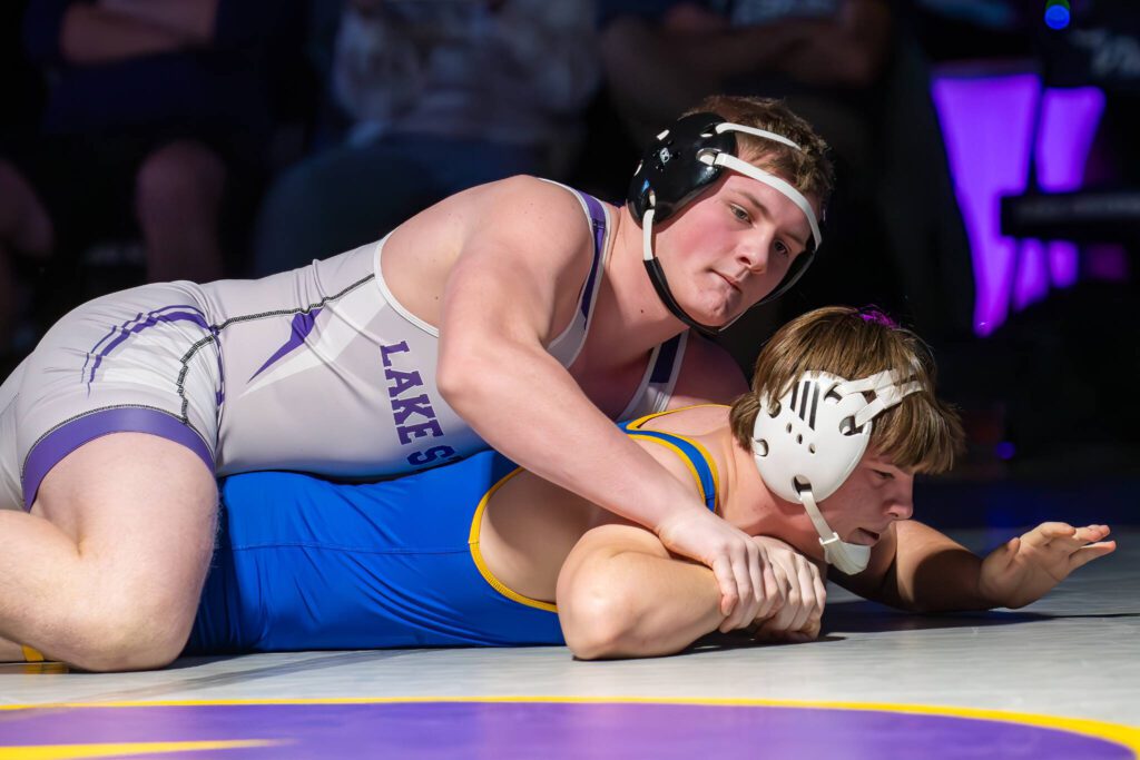 Lake Stevens’ Koen Mattern (top) wrestles during a match against Tahoma on Jan. 26 in Lake Stevens. (John Gardner / Pro Action Image)
