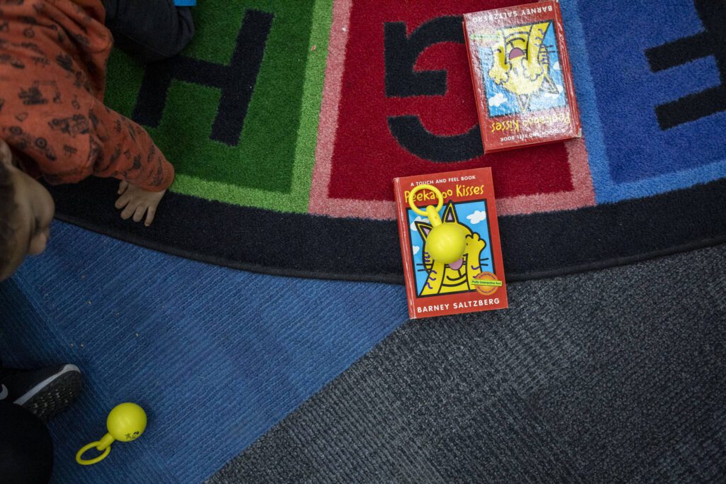 Kids play during Toddler Storytime at the Main Everett Library on Tuesday, Feb. 13, 2024 in Everett, Washington. (Annie Barker / The Herald)

