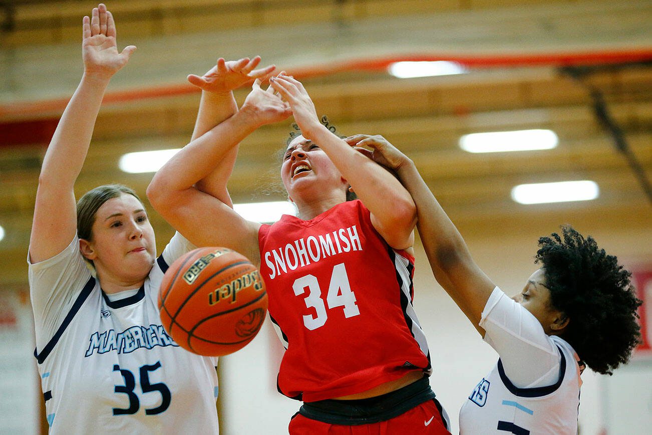 Snohomish’s Tyler Gildersleeve-Stiles gets fouled while trying to score down low against Meadowdale during the 3A District One Semifinals on Wednesday, Feb. 14, 2024, at Marysville Pilchuk High School in Marysville, Washington. (Ryan Berry / The Herald)