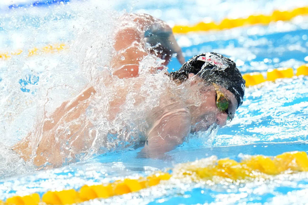 Matt King of Team United States swims in the Men's 4x100m Medley Relay final at the World Aquatics Championships in Doha, Qatar, Sunday, Feb. 18, 2024. (AP Photo/Hassan Ammar)