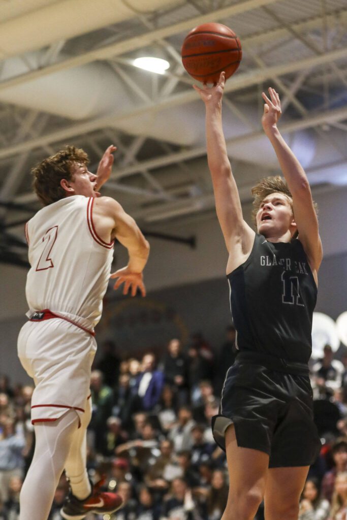 Glacier Peak’s Reed Nagel (11) shoots the ball during a boys Class 4A bi-district title game between Glacier Peak and Mount Si at North Creek High School on Friday, Feb. 16, 2024 in Bothell, Washington. The Wildcats won, 59-53.(Annie Barker / The Herald)

