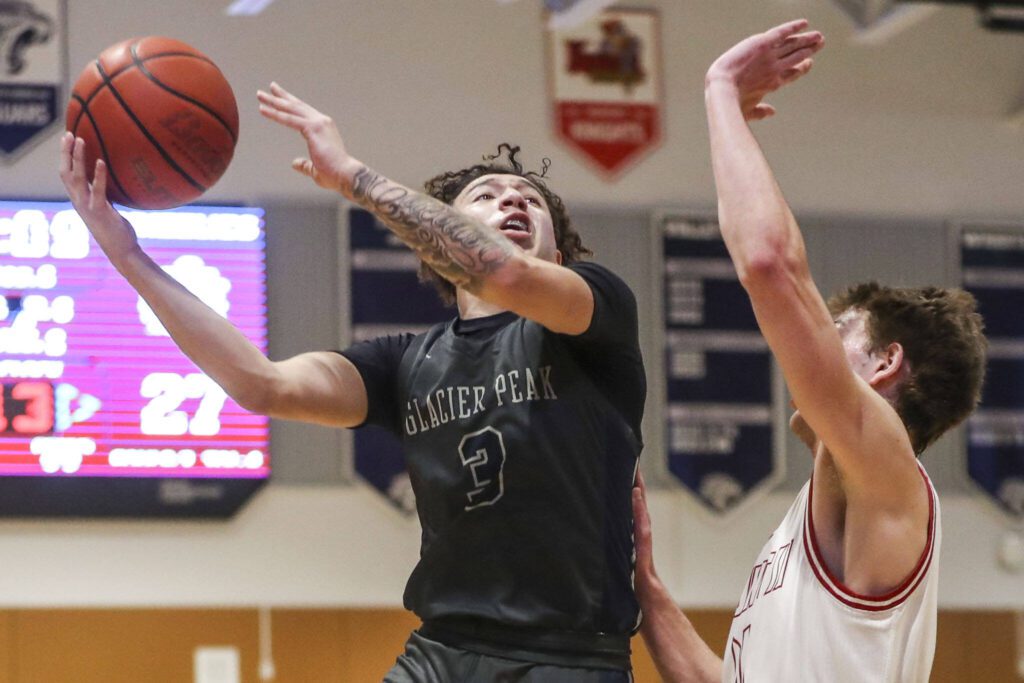 Glacier Peak’s Isaiah Cuellar (3) shoots the ball during a boys Class 4A bi-district title game between Glacier Peak and Mount Si at North Creek High School on Friday, Feb. 16, 2024 in Bothell, Washington. The Wildcats won, 59-53.(Annie Barker / The Herald)
