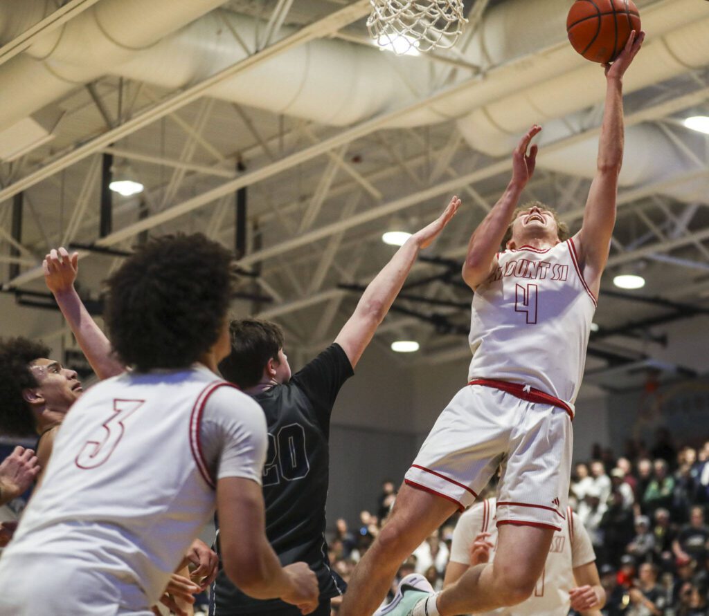 Mount Si’s Trevor Hennig (4) shoots the ball during a boys Class 4A bi-district title game between Glacier Peak and Mount Si at North Creek High School on Friday, Feb. 16, 2024 in Bothell, Washington. The Wildcats won, 59-53.(Annie Barker / The Herald)
