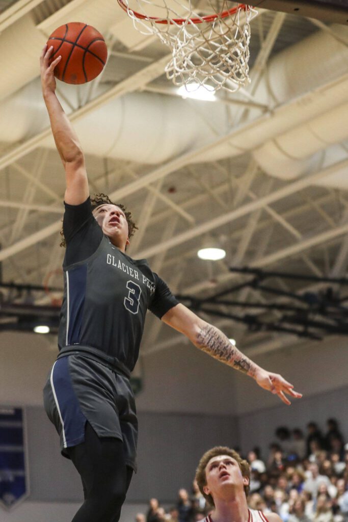 Glacier Peak’s Isaiah Cuellar (3) shoots the ball during a boys Class 4A bi-district title game between Glacier Peak and Mount Si at North Creek High School on Friday, Feb. 16, 2024 in Bothell, Washington. The Wildcats won, 59-53.(Annie Barker / The Herald)
