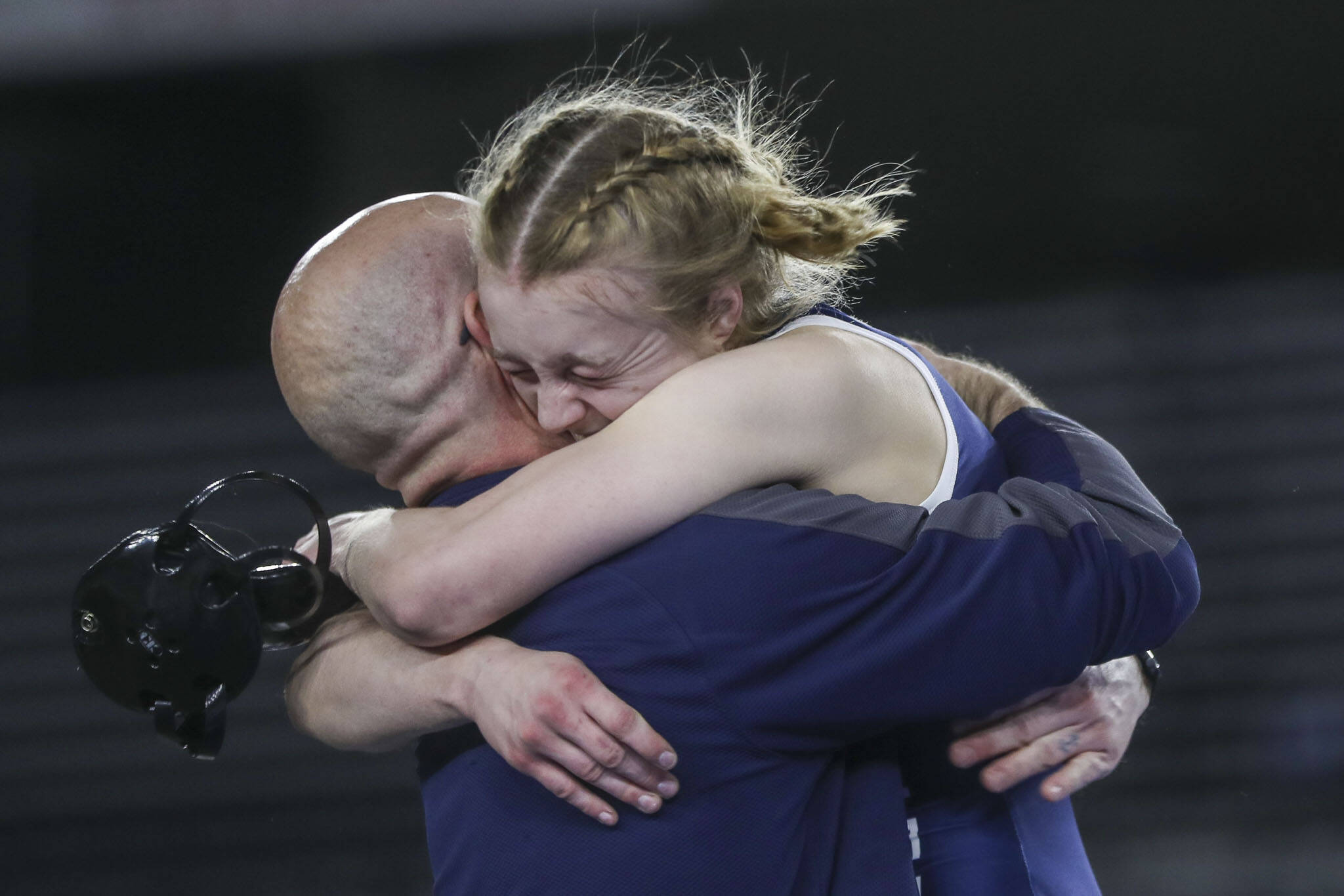 Glacier Peak’s Karianne Baldwin celebrates winning the 4A/3A girls 125-pound championship match during Mat Classic XXXV on Saturday, Feb. 17, 2024, at the Tacoma Dome in Tacoma. (Annie Barker / The Herald)