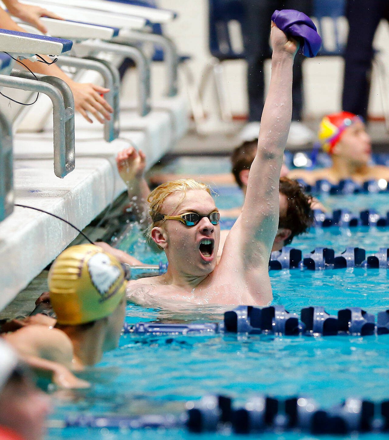 Lake Stevens junior Camden Blevins-Mohr celebrates his state title in the 50 yard freestyle during the WIAA 4A Boys Swim and Dive Championships on Saturday, Feb. 17, 2024, at the Weyerhaeuser King County Aquatic Center in Federal Way, Washington. (Ryan Berry / The Herald)