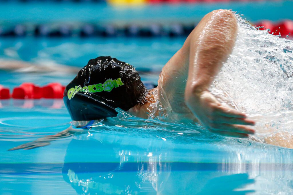 Jackson’s Ethan Georgiev swims in the 200 yard freestyle final during the WIAA 4A Boys Swim and Dive Championships on Saturday, Feb. 17, 2024, at the Weyerhaeuser King County Aquatic Center in Federal Way, Washington. (Ryan Berry / The Herald)
