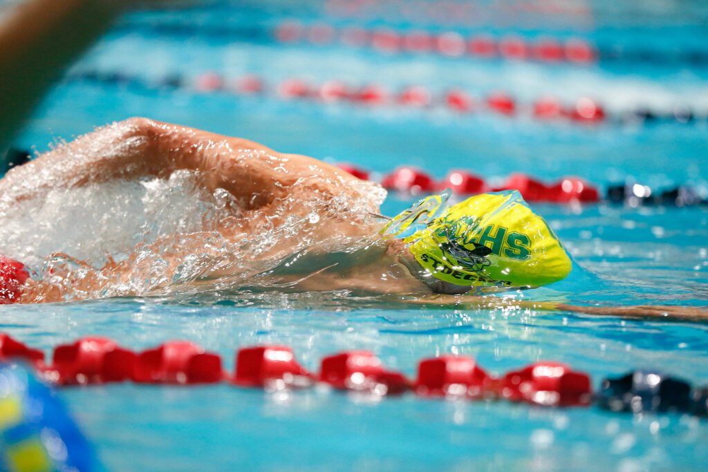 Shorecrest’s Colton Stoecker swims for his team in the 400 yard freestyle relay final during the WIAA 3A Boys Swim and Dive Championships on Saturday, Feb. 17, 2024, at the Weyerhaeuser King County Aquatic Center in Federal Way, Washington. (Ryan Berry / The Herald)

