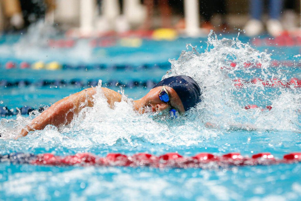 Shorewood freshman Frederick Anderson swims anchor for his team in the 400 yard freestyle relay consolation race during the WIAA 3A Boys Swim and Dive Championships on Saturday, Feb. 17, 2024, at the Weyerhaeuser King County Aquatic Center in Federal Way, Washington. (Ryan Berry / The Herald)
