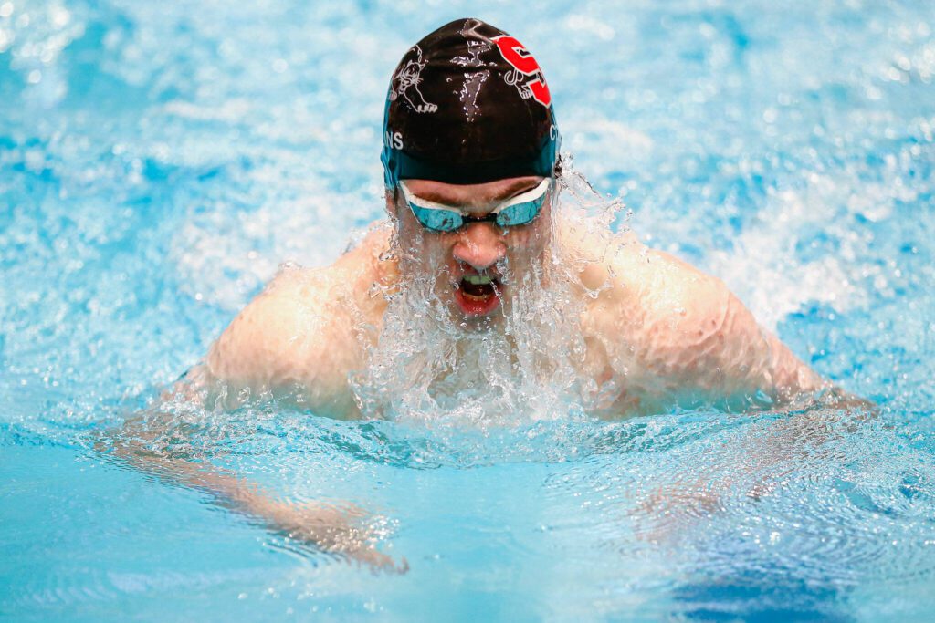 Snohomish junior Owen Collins takes third place in state in the 100 yard breaststroke during the WIAA 3A Boys Swim and Dive Championships on Saturday, Feb. 17, 2024, at the Weyerhaeuser King County Aquatic Center in Federal Way, Washington. (Ryan Berry / The Herald)
