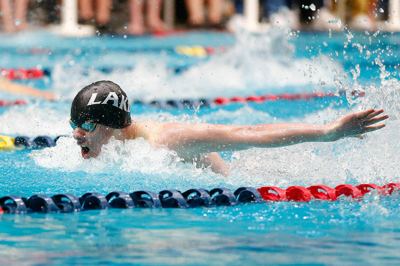 Lake Stevens junior Camden Blevins-Mohr swims his way to a state title in the 100 yard butterfly during the WIAA 4A Boys Swim and Dive Championships on Saturday, Feb. 17, 2024, at the Weyerhaeuser King County Aquatic Center in Federal Way, Washington. (Ryan Berry / The Herald)