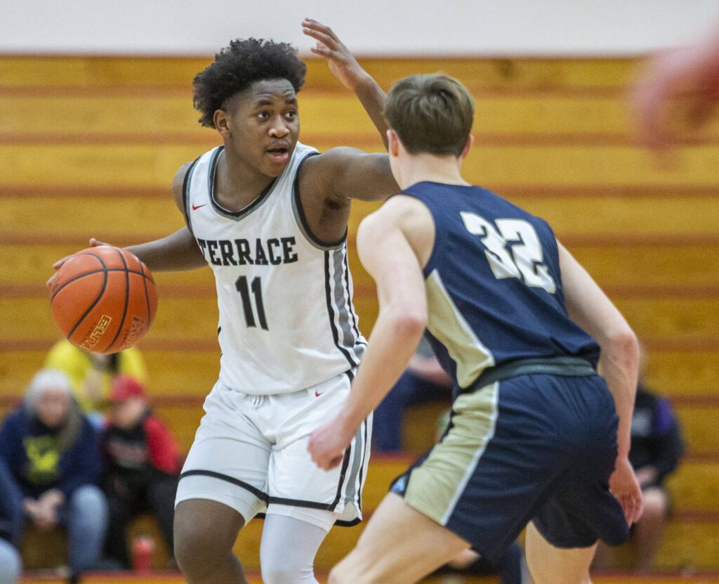 Mountlake Terrace’s Rayshaun Connor calls a play during the 3A boys district championship game against Arlington on Saturday, Feb. 17, 2024 in Marysville, Washington. (Olivia Vanni / The Herald)
