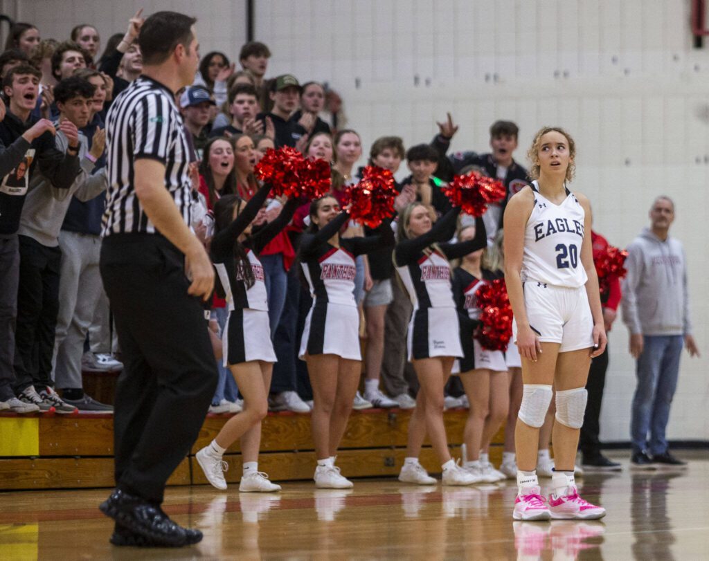 Arlington’s Samara Morrow reacts to the referee calling a foul on her during the 3A girls district championship game against Snohomish on Saturday, Feb. 17, 2024 in Marysville, Washington. (Olivia Vanni / The Herald)
