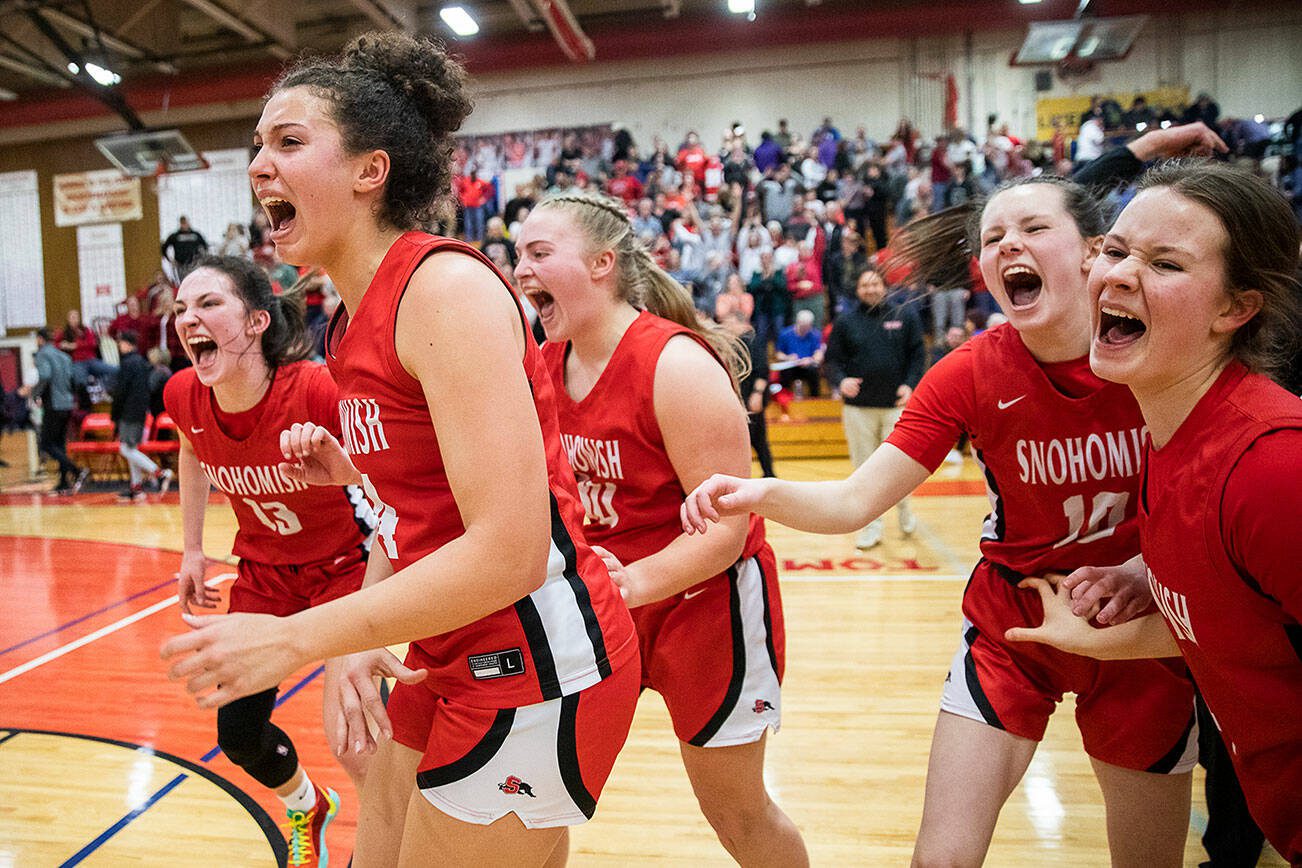 Snohomish players reacts to winning the 3A girls district championship on Saturday, Feb. 17, 2024 in Marysville, Washington. (Olivia Vanni / The Herald)