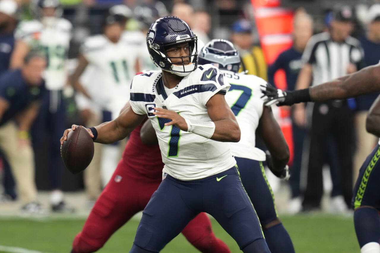 Seattle Seahawks quarterback Geno Smith (7) plays against the Arizona Cardinals in the first half of a game Jan. 7 in Glendale, Ariz. (AP Photo/Ross D. Franklin)