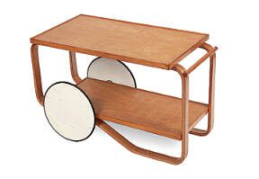 Teatime comes to modern times. Scandinavian modern design gives an Artek tea trolley a sleek, stylish look.