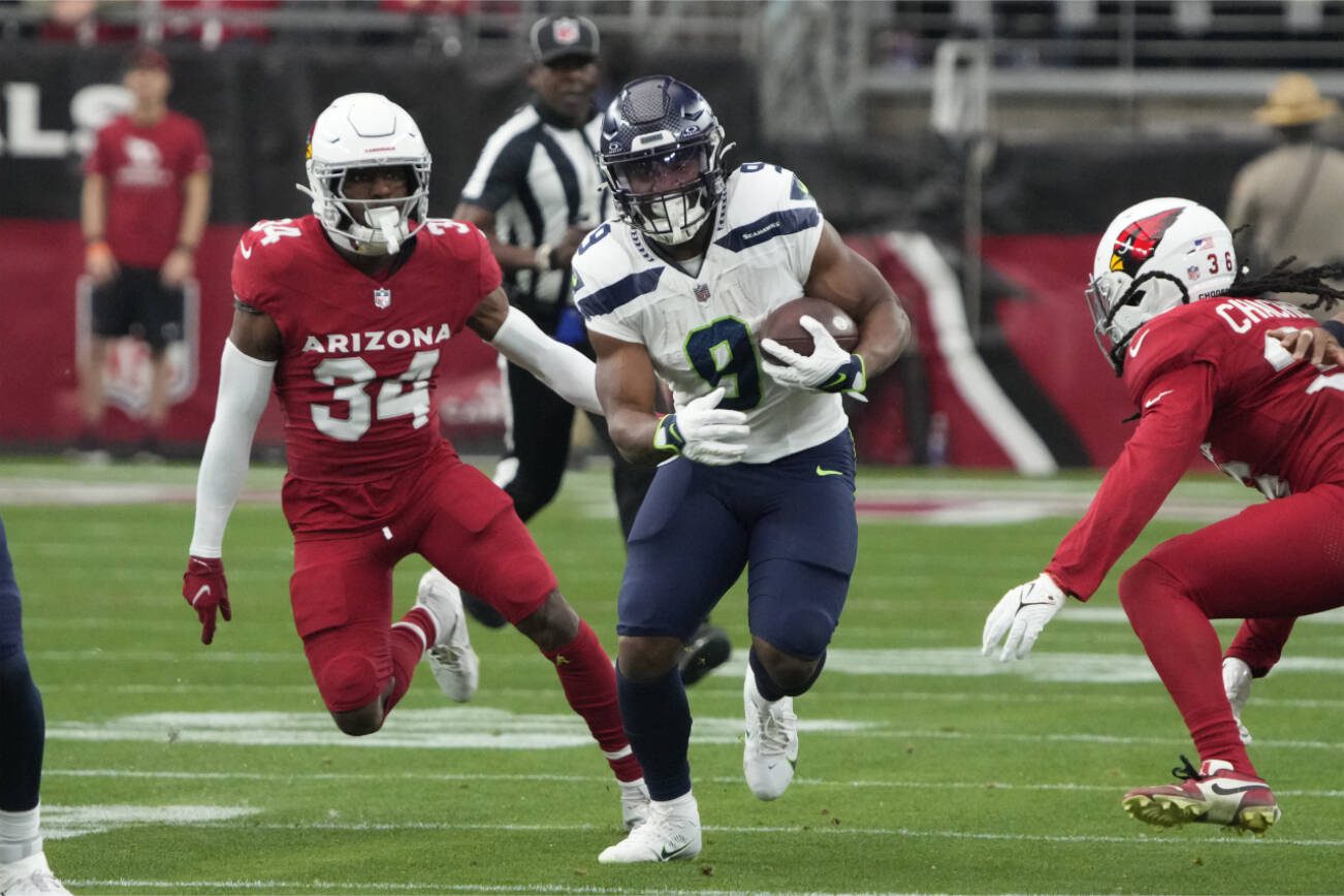 Seattle Seahawks running back Kenneth Walker III (9) during the first half of an NFL football game against the Arizona Cardinals, Sunday, Jan. 8, 2024, in Glendale, Ariz. (AP Photo/Rick Scuteri)