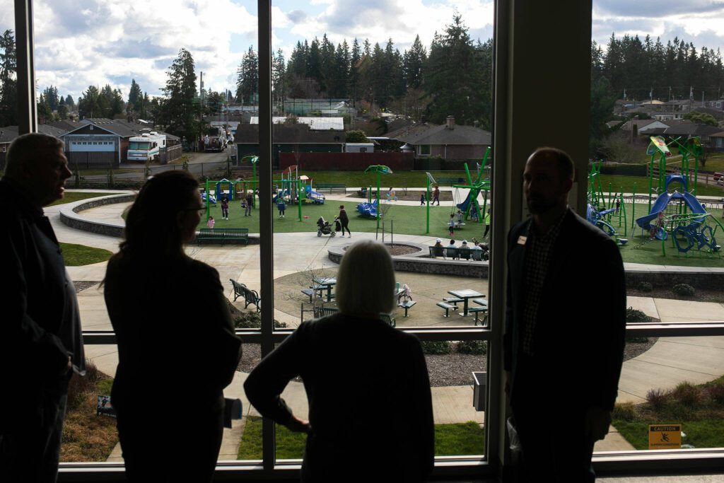 Sen. Patty Murray looks over the playground outside the Everett YMCA during a tour of the facility Thursday, Feb. 22, 2024, in Everett, Washington. (Ryan Berry / The Herald)

