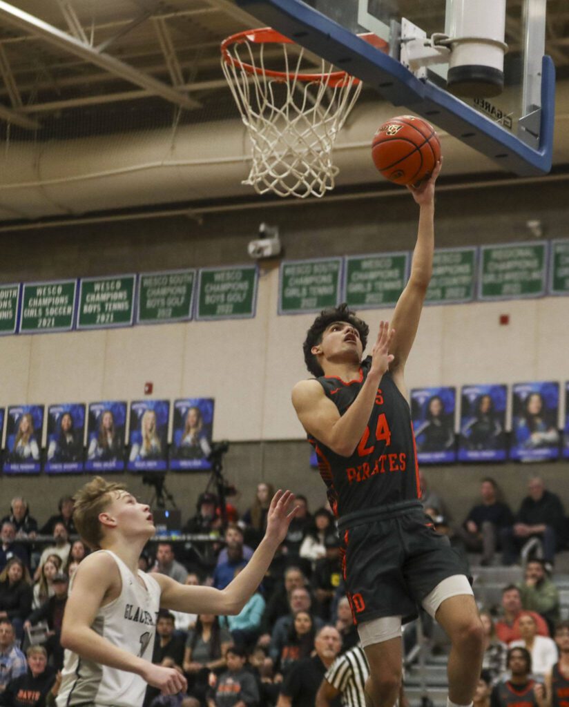 Davis’ Cesar Hernandez (24) shoots the ball during a boys game between Glacier Peak and Davis at Shorewood High School on Friday, Feb. 23, 2024, in Shoreline, WA. Glacier Peak fell, 65-54.. (Annie Barker / The Herald)
