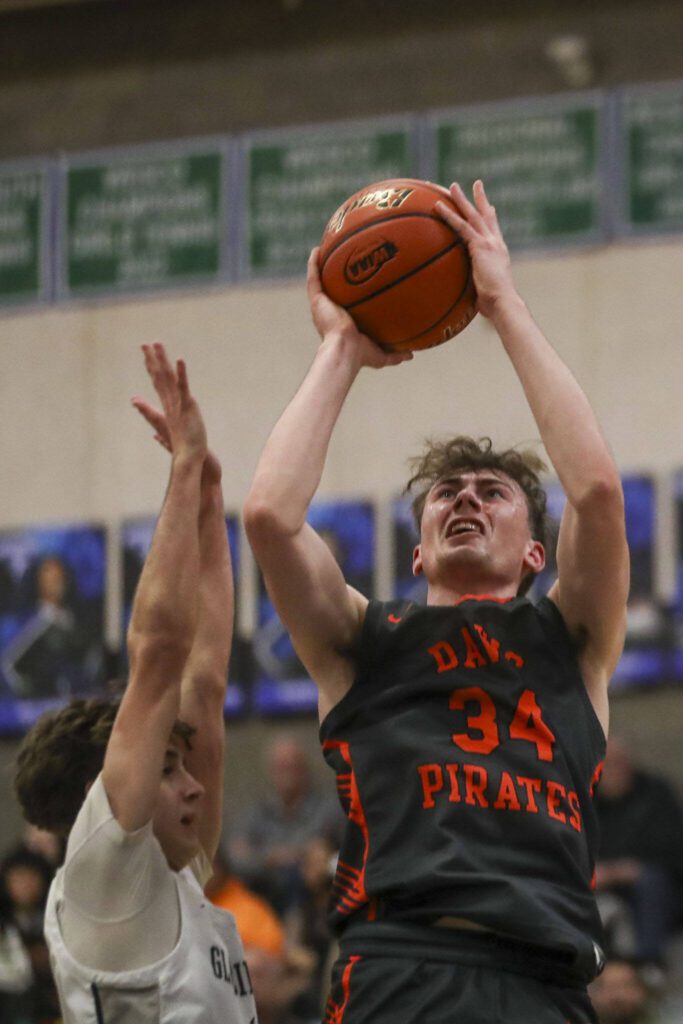 Davis’ Finnegan Anderson (34) shoots the ball during a boys game between Glacier Peak and Davis at Shorewood High School on Friday, Feb. 23, 2024, in Shoreline, WA. Glacier Peak fell, 65-54.. (Annie Barker / The Herald)
