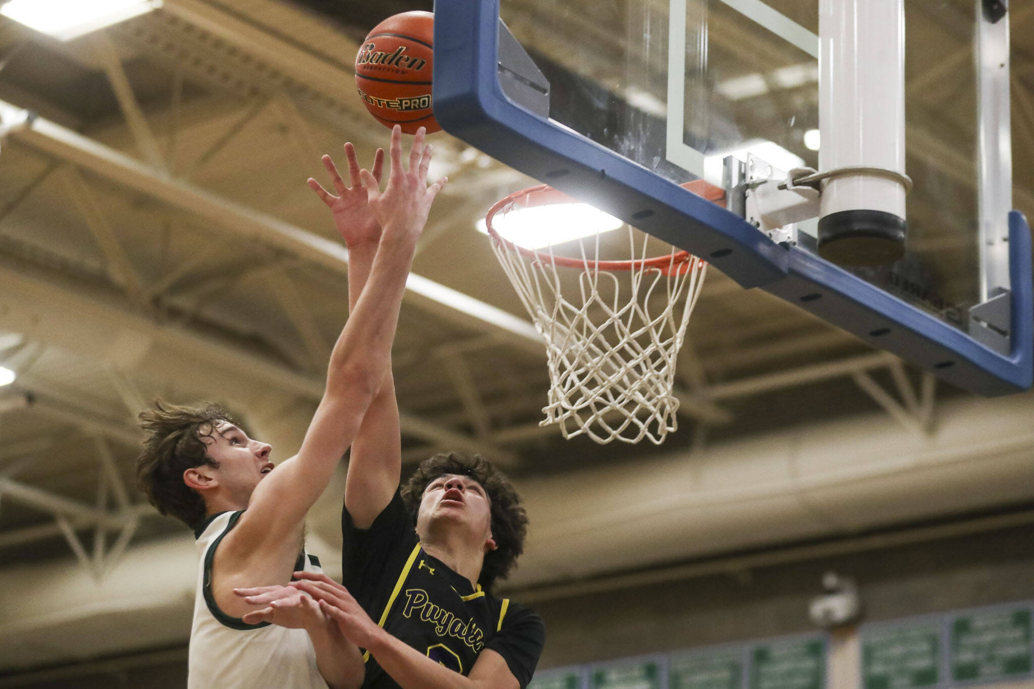 Jackson’s Ryan Mcferran (0) shoots the ball during a boys game between Jackson and Puyallup at Shorewood High School on Friday, Feb. 23, 2024, in Shoreline, WA. Jackson won, 55-48. (Annie Barker / The Herald)