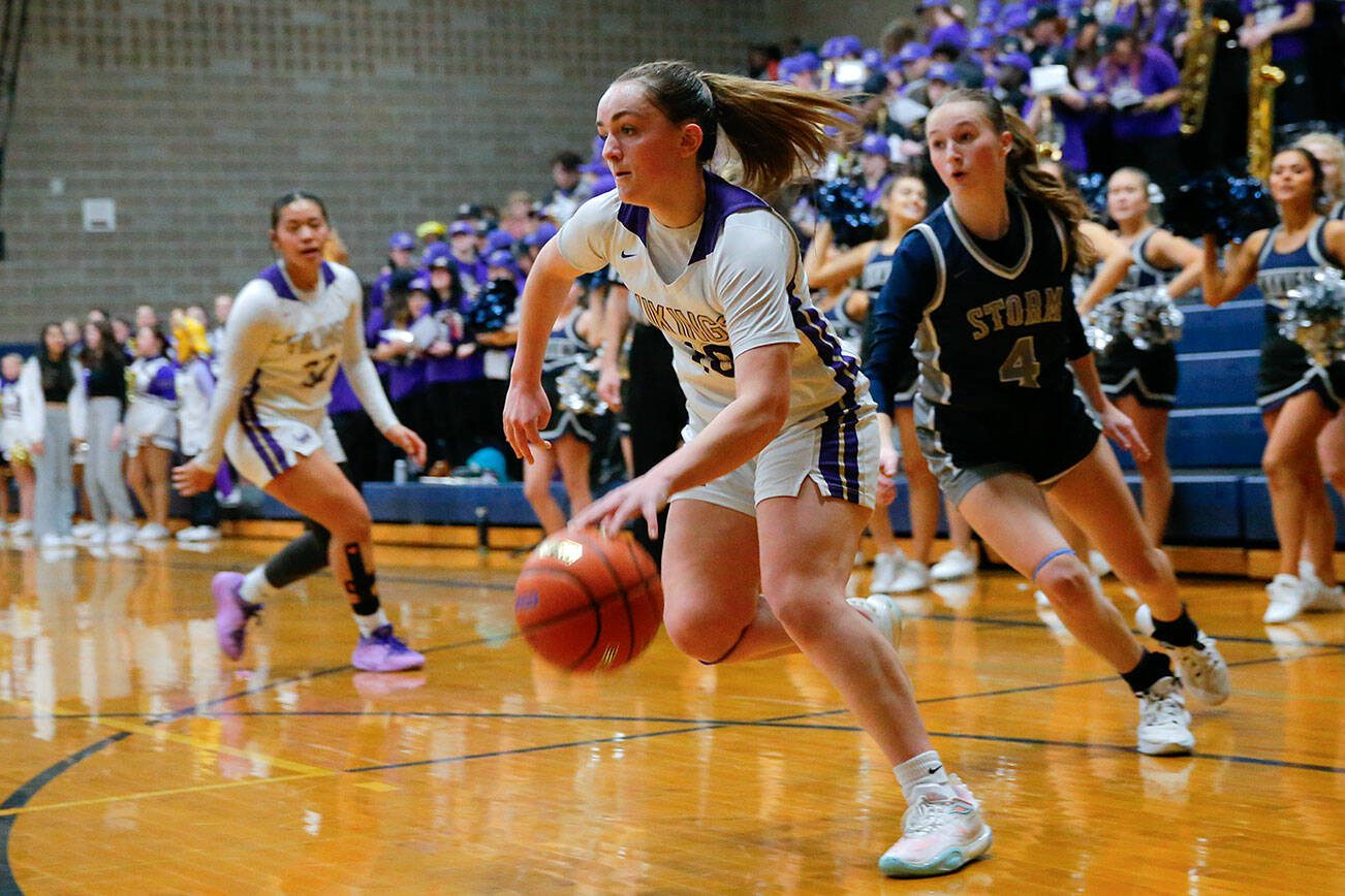 Lake Stevens’ Tessa Anastasi heads to the basket against Skyview during a playoff matchup at Arlington High School on Friday, Feb. 23, 2024, in Arlington, Washington. (Ryan Berry / The Herald)