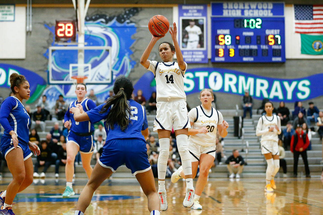 Everett senior Mae Washington pulls up and shoots a jumper against Seattle Prep during a playoff matchup at Shorewood High School on Saturday, Feb. 24, 2024, in Shoreline, Washington. (Ryan Berry / The Herald)