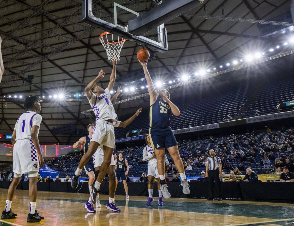 Arlington’s Billy Kooy attempts a layup during the 3A boys state basketball game against Garfield on Wednesday, Feb. 28, 2024 in Tacoma, Washington. (Olivia Vanni / The Herald)
