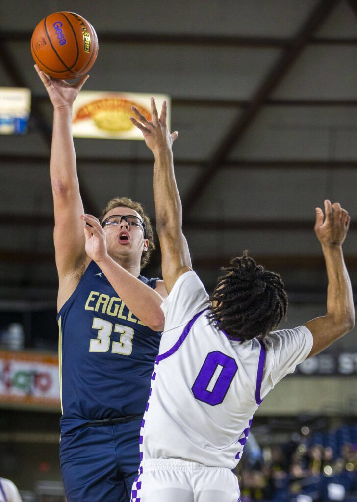 Arlington’s Billy Kooy attempts a layup during the 3A boys state basketball game against Garfield on Wednesday, Feb. 28, 2024 in Tacoma, Washington. (Olivia Vanni / The Herald)
