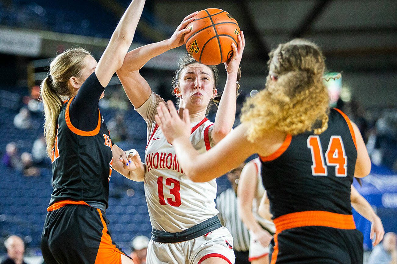 Snohomish’s Sienna Capelli looks for an open shot during the 3A girls state basketball game against Kennewick on Wednesday, Feb. 28, 2024 in Tacoma, Washington. (Olivia Vanni / The Herald)