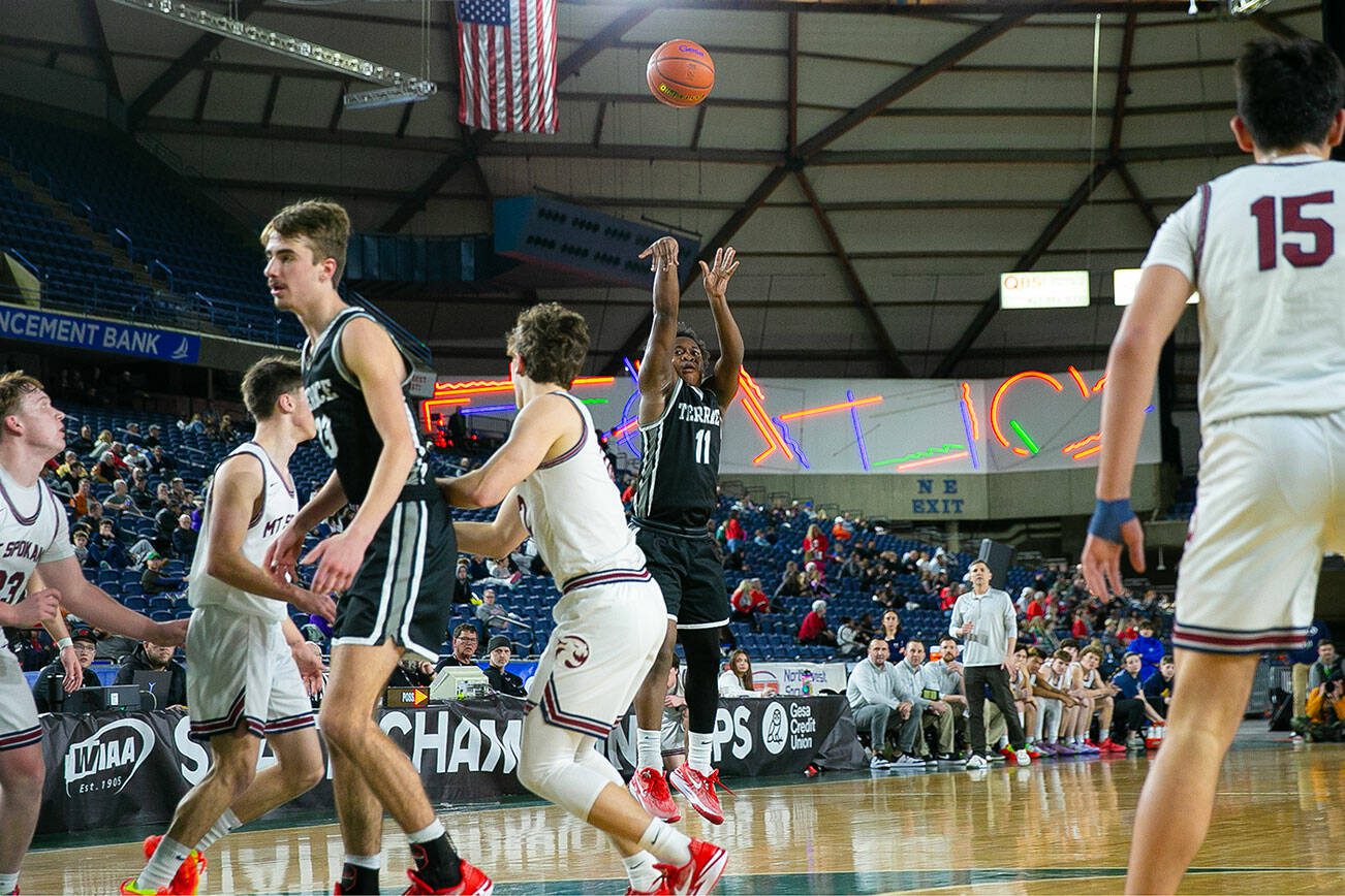 Mountlake Terrace’s Rayshaun Connor shoots a three during a WIAA 3A Boys Basketball quarterfinal against Mount Spokane on Thursday, Feb. 29, 2024, at the Tacoma Dome in Tacoma, Washington. (Ryan Berry / The Herald)