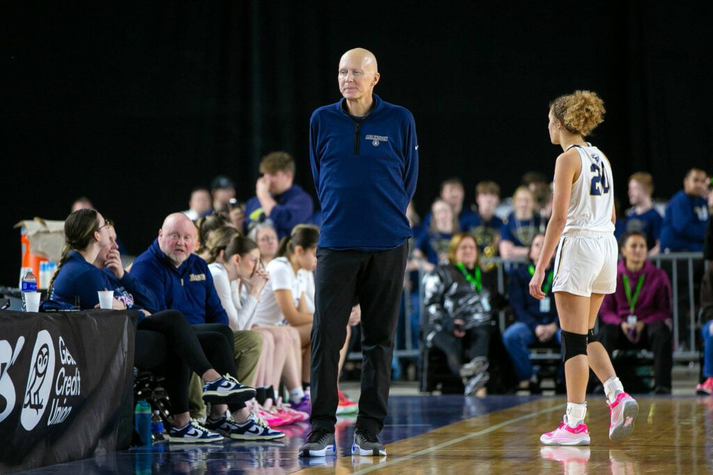 Arlington head coach Joe Marsh watches as time dwindles in his team’s loss to Snohomish during a WIAA 3A Girls Basketball quarterfinal on Thursday, Feb. 29, 2024, at the Tacoma Dome in Tacoma, Washington. (Ryan Berry / The Herald)
